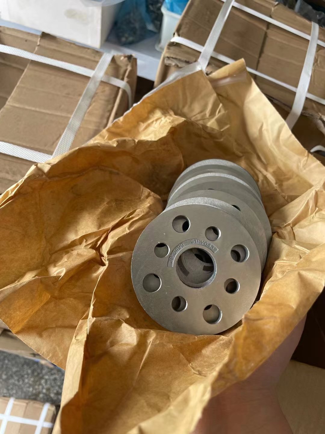 Industrial metal components wrapped with VCI paper for rust prevention